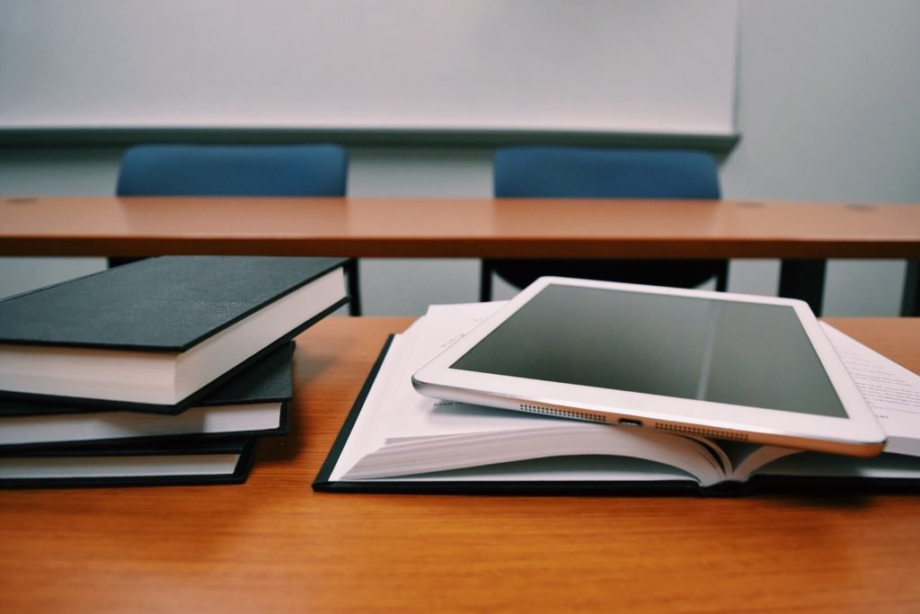 Book And ipad on a table