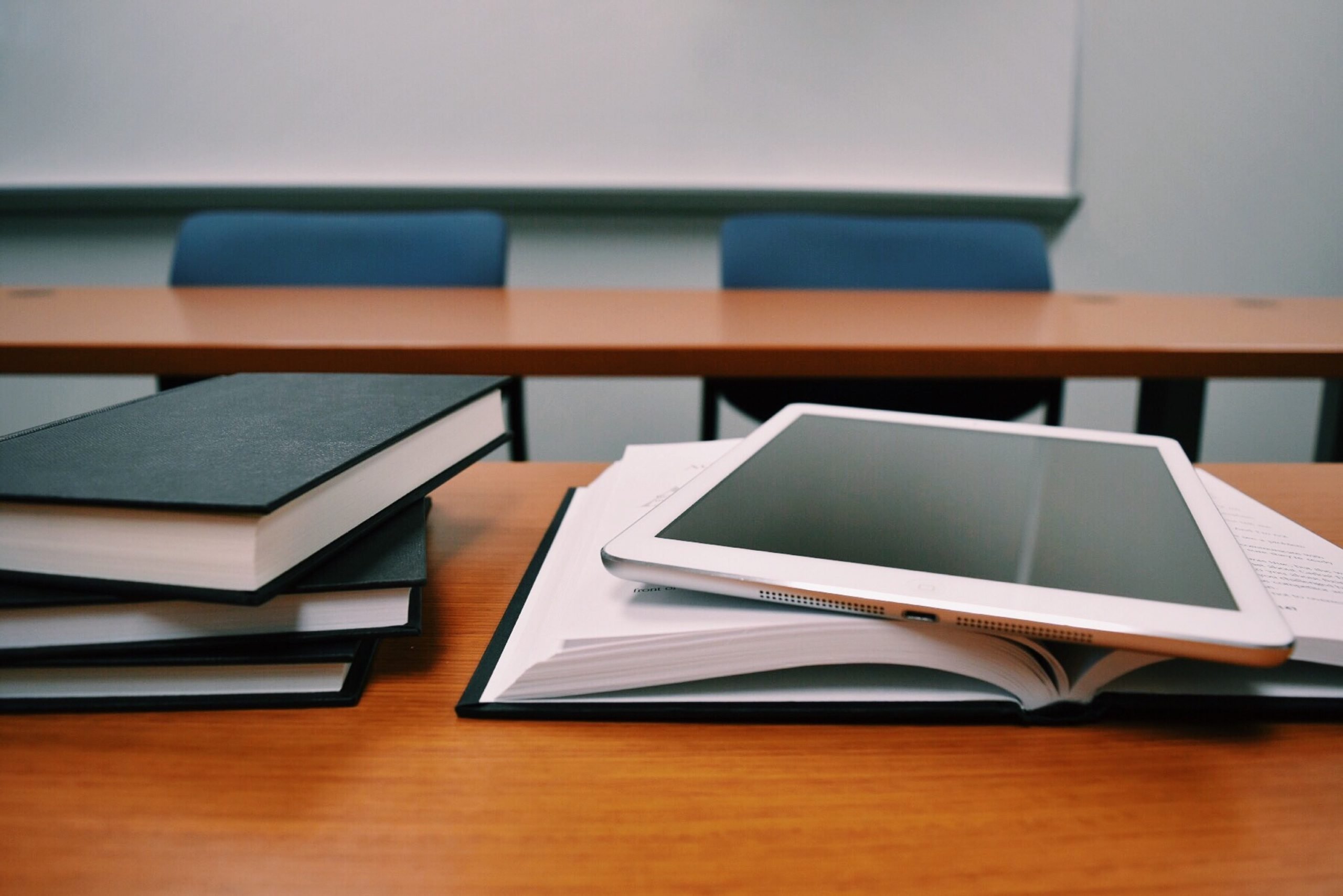 Book And ipad on a table