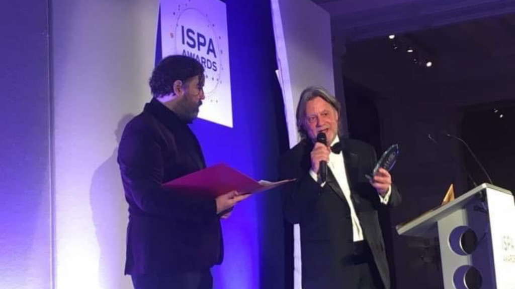 Paul Finnis on stage accepting the ISPA Internet Hero Award