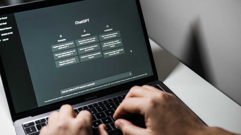 Screen with ChatGPT chat with AI or artificial intelligence. Man search for information using artificial intelligence